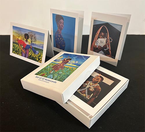 box of 12 cards with featured artwork